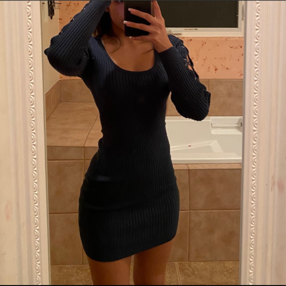 Tight , dark green dress